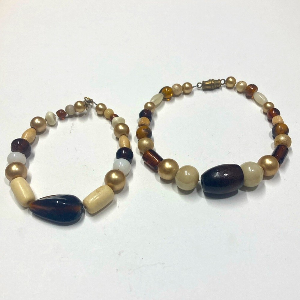 Set of 2 handmade beaded bracelets in brown and gold. Original design